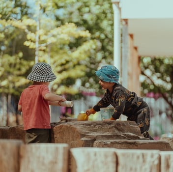two children socialising in a kindergarten