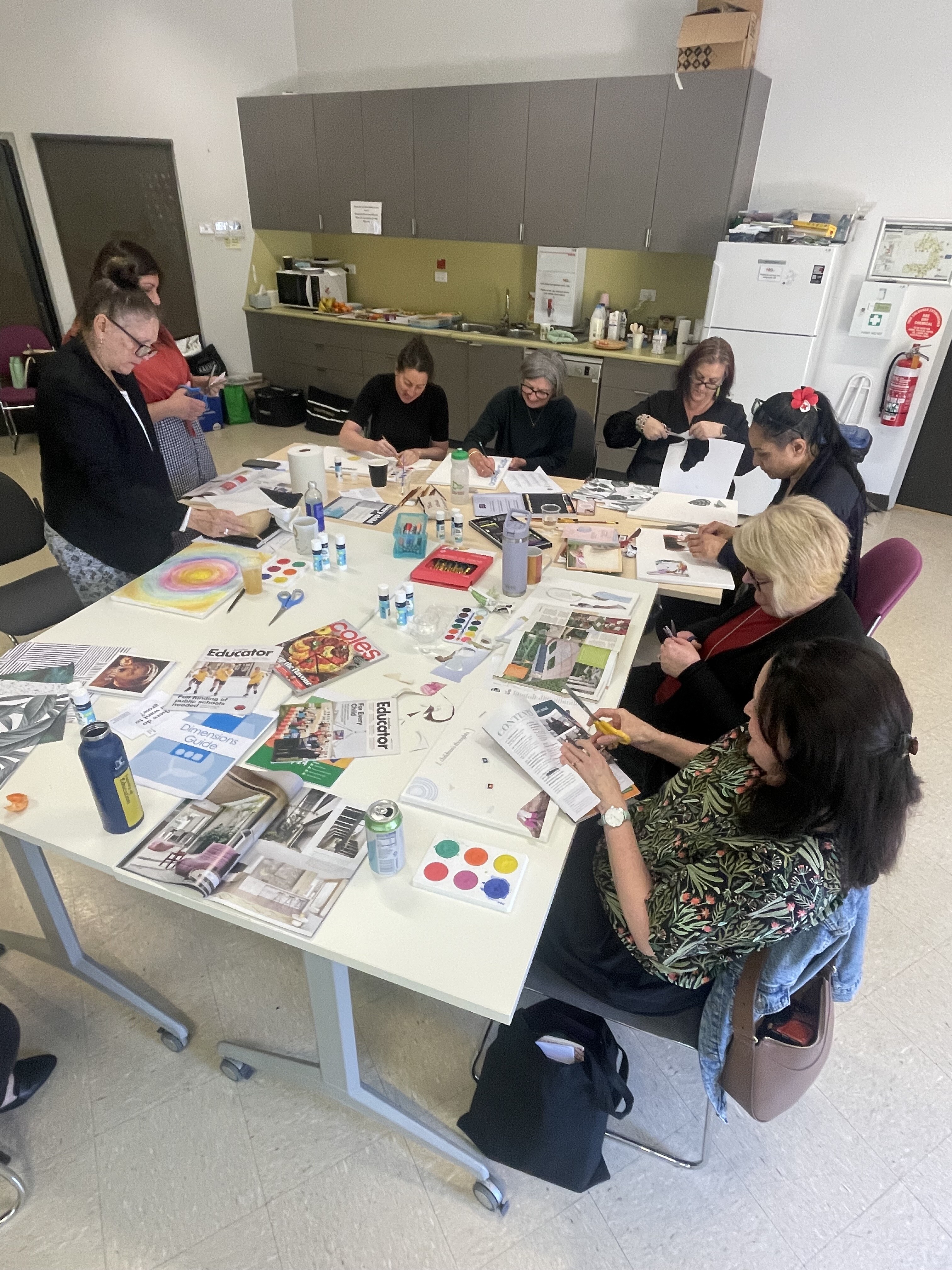 A group of educators work together at a table