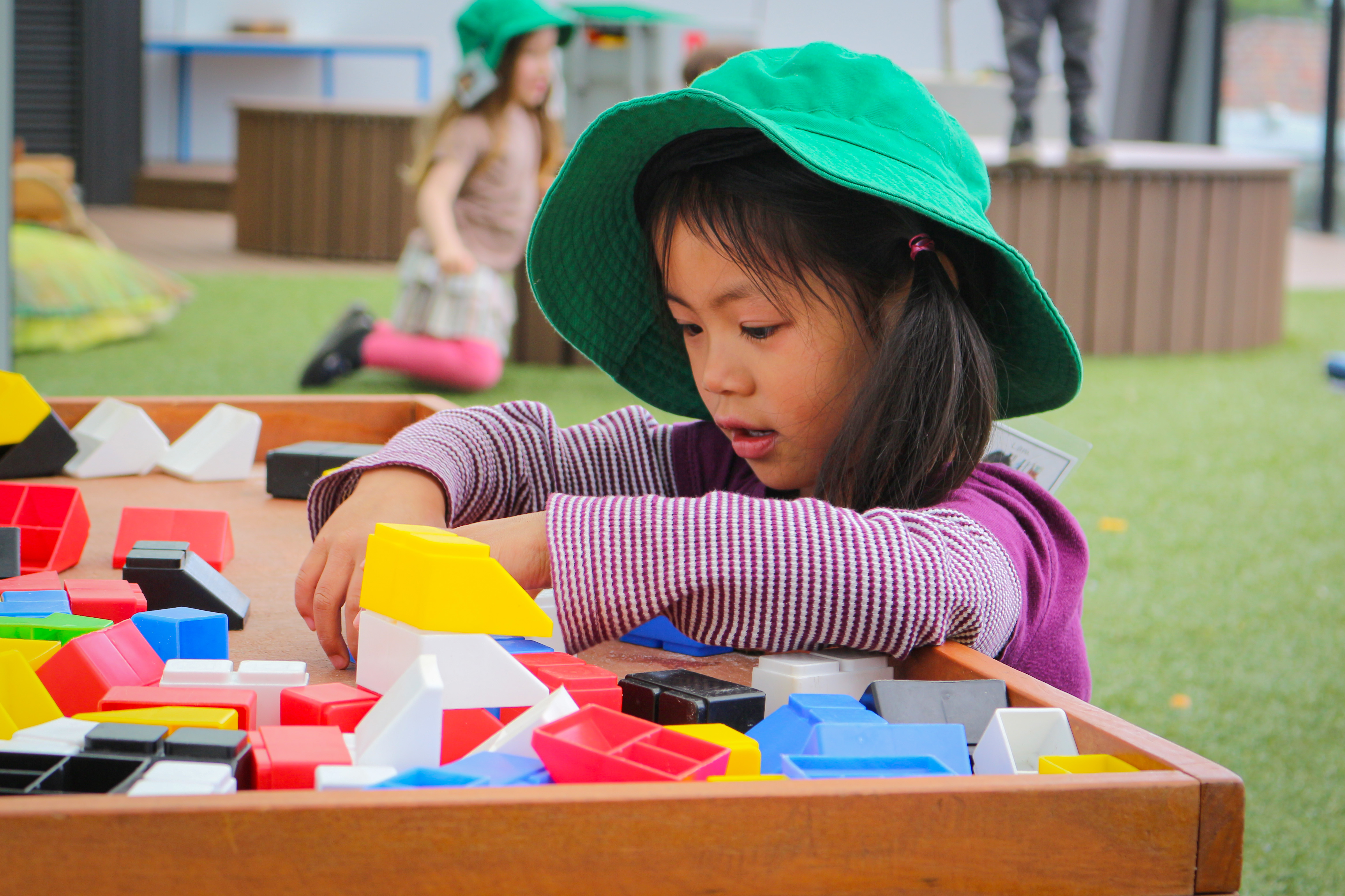 A child plays with shapes
